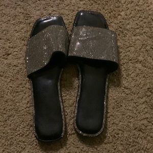 Black slides, from a shop in Florida, cleaning my closet out